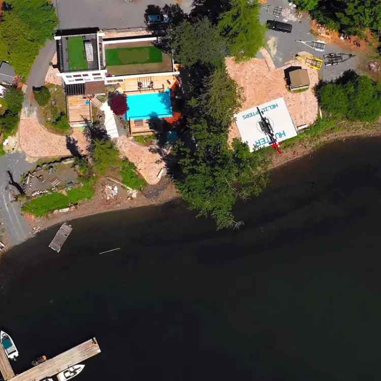 Lakefront Executive Home with Pool Hot Tub and Helicopter Pad