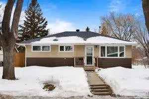 Buy House in Regina with Updated Kitchen and Large Backyard