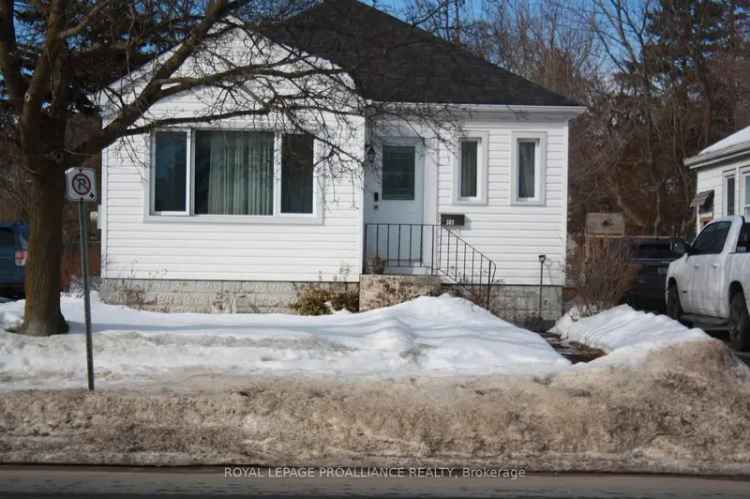 Buy bungalow in a great location with sunroom and fireplace