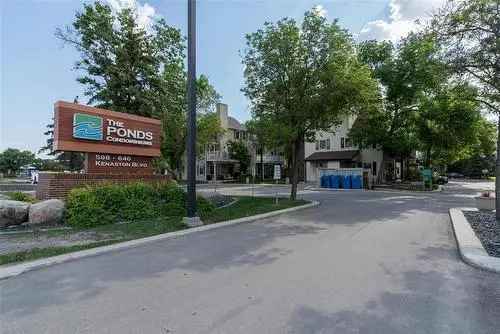 Condo for Sale in Mathers Winnipeg with Private Stone Patio and Pool