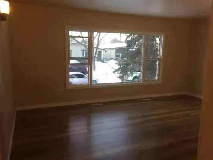 Rent 3 Bedroom Main Floor Suite with Double Garage in Ideal Location