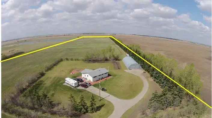 40 Acre Industrial Lot with House and Shop in Conrich