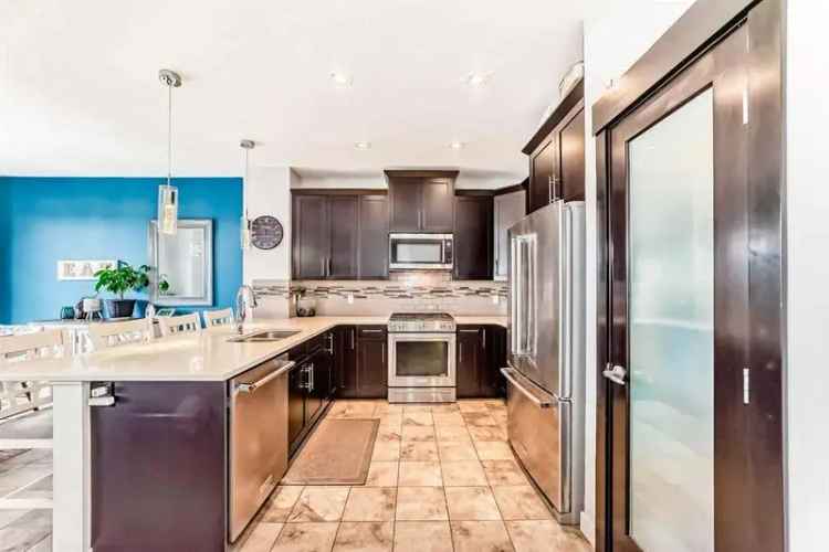 4 Bed Detached Home with Legal Suite & Mountain Views