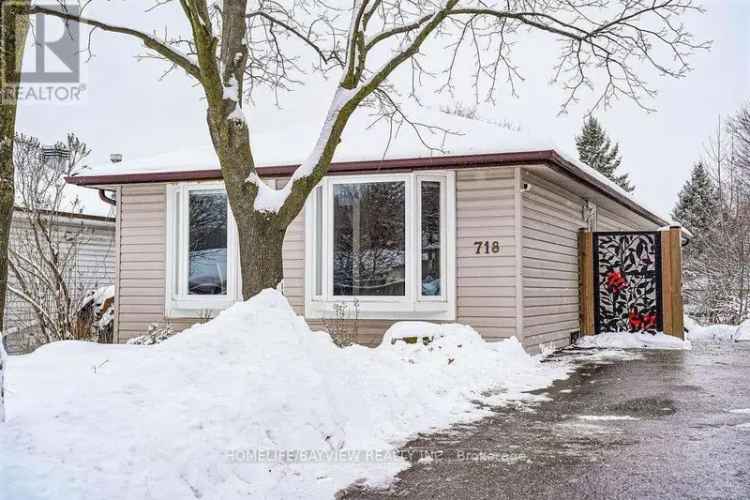 Charming Bungalow 4 Bedrooms Finished Walk Out Basement