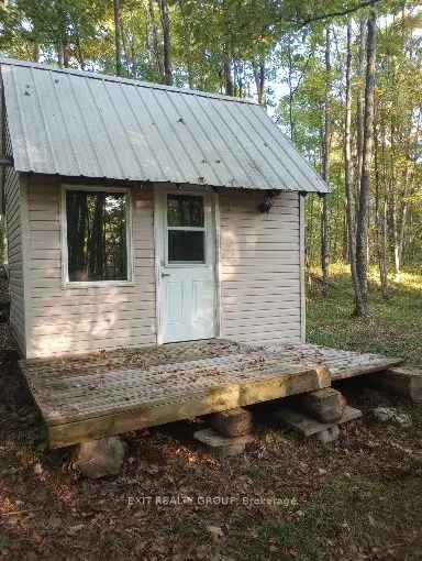 Buy Cabin with Land in Central Frontenac Ideal for Nature Lovers