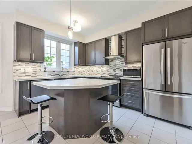 Stunning Freehold Townhouse 2-Storey 2 Car Garage Hardwood Floors Upgraded Kitchen