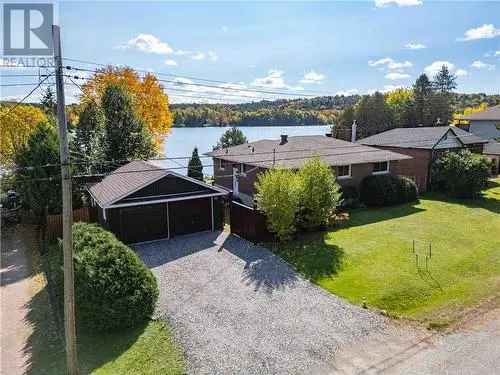 Bungalow for Sale in Greater Sudbury with Waterfront Living Features