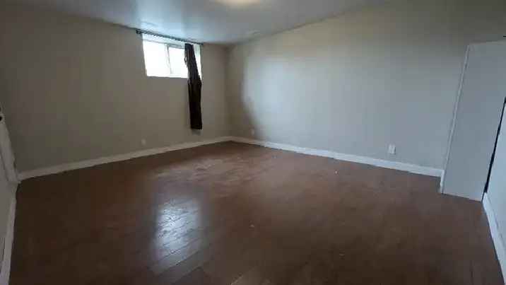 Large Sharing Room for Male - Basement Suite with Egress Window