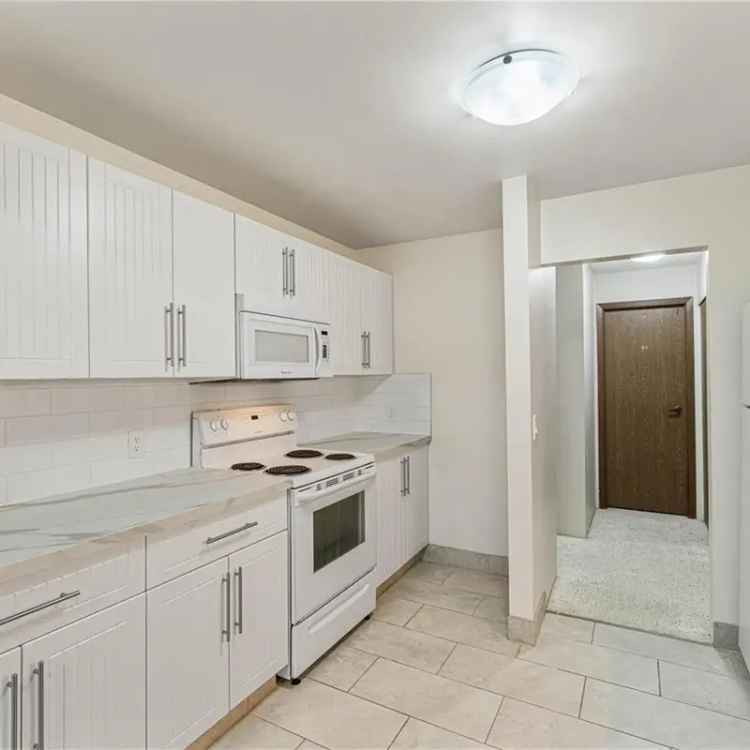 Bright 2-Bedroom Condo with Updated Kitchen and Two Balconies