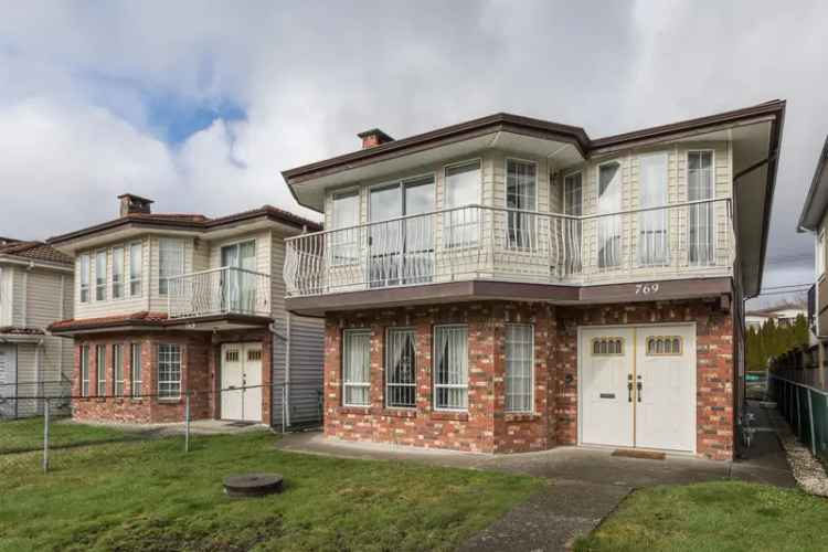 For Sale Vancouver Special House with 2 Bedroom Suite in Vancouver East