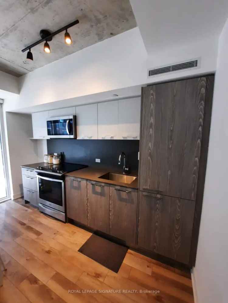 Riverside Leslieville Condo 1 Bed + Den 9Ft Ceilings Open Terrace Parking