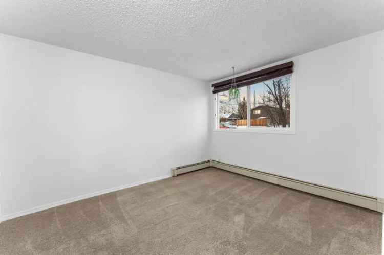 Ground Floor Okotoks Condo near D'arcy Crossing