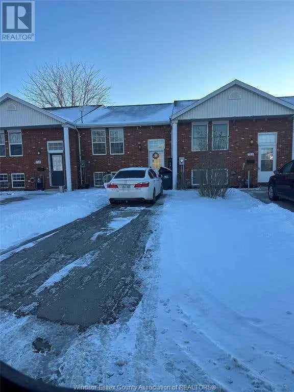 Bi Level Townhome Investment Opportunity 4 Beds 2 Baths