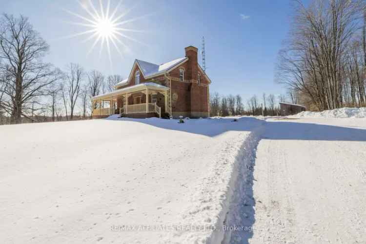 12-Acre Property with Log Cabin, Pond, and Family Home