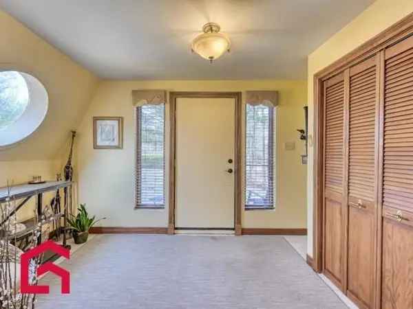 Unique Polygonal Home on Riverfront Lot