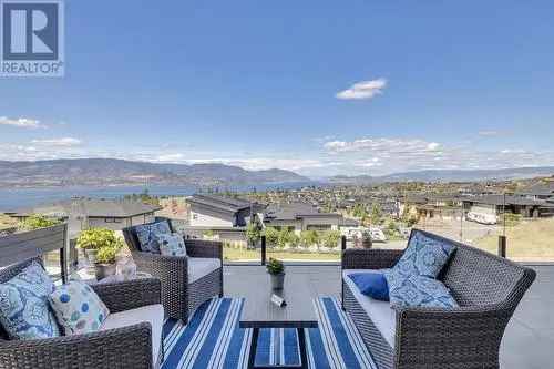 Modern farmhouse for sale in Southwest Mission Kelowna with lake views