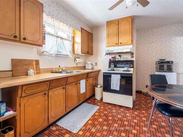 Charming Brick Bungalow with Fireplace and Large Basement