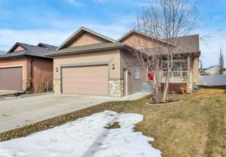 Buy bungalow home in Lakeway Landing Sylvan Lake with 5 bedrooms and green space