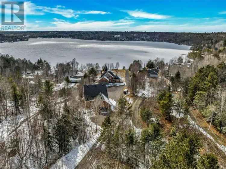 Elegant 3-Story Brick Home on 1.7 Acres with Lake Views and Hangar