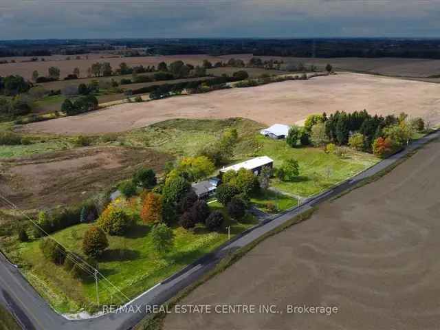 1982 Bungalow on 46.82 Acres Near Highway 403