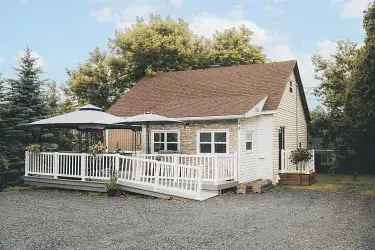 Charming 3-Bedroom Home with Main Floor Bedroom and Large Garage