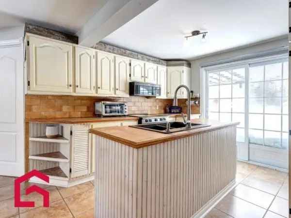 Saint-Colomban Bungalow for Sale 2BR Rustic Charm