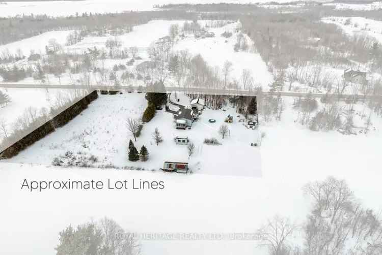 Raised Bungalow for Sale in Countryside with Detached Garage and Sunroom