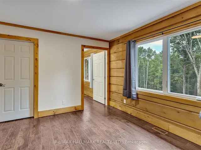 Luxury Log Home on 6.5 Acres Near Bancroft Airport