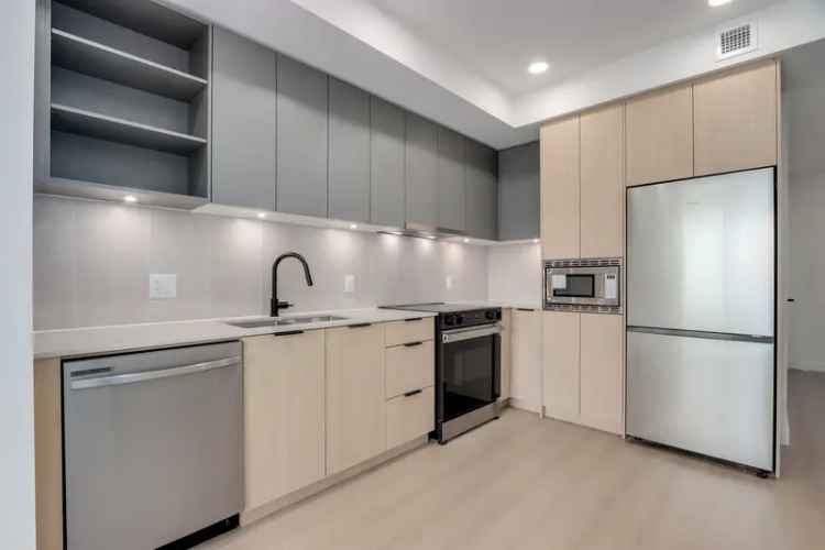 Queen Mary Park Surrey Condo 1 Bed + Den for Sale