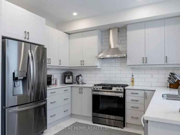 Executive Freehold Townhome for Sale in Summerhill Estates with Modern Features