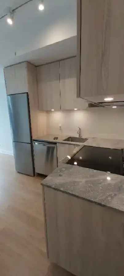 Bachelor Apartment in Liberty Village with Modern Finishes and Amenities