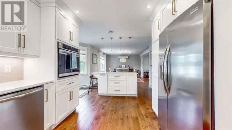 3360 sq ft Home in Pouch Cove with 2 Garages and Landscaped Lot