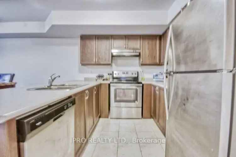 Buy End Unit Townhouse in Sought After Community with Modern Features